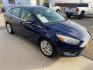 2017 Blue Ford Focus Titanium (1FADP3J25HL) with an 2.0L Flex Fuel I4 160hp 146ft. lbs. engine, 6-Speed Double Clutc transmission, located at 842 E South Street, Powell, WY, 82435, (307) 754-7289, 44.752300, -108.746933 - Photo#1