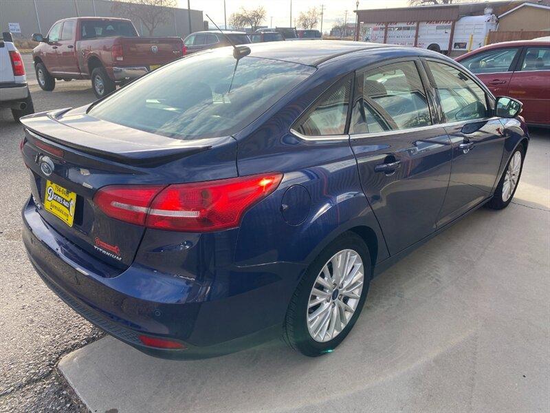 2017 Kona Blue Ford Focus Titanium (1FADP3J25HL) with an 2.0L Flex Fuel I4 160hp 146ft. lbs. engine, Automatic transmission, located at 842 E South Street, Powell, WY, 82435, (307) 754-7289, 44.752300, -108.746933- Photo#2