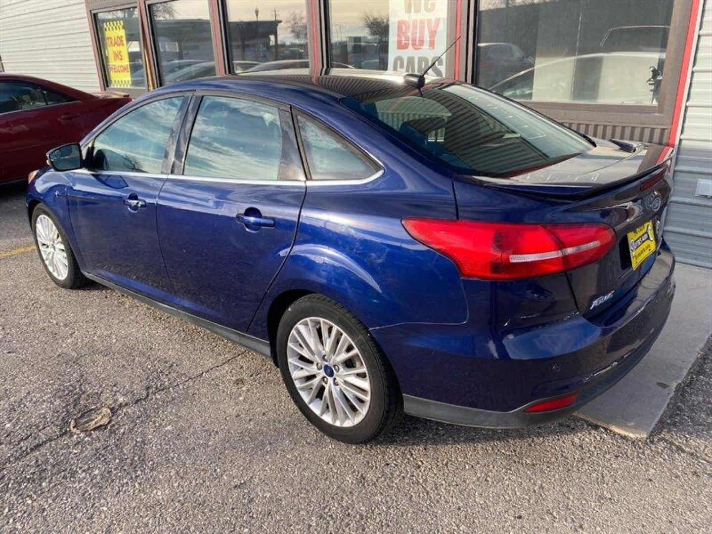 2017 Blue Ford Focus Titanium (1FADP3J25HL) with an 2.0L Flex Fuel I4 160hp 146ft. lbs. engine, 6-Speed Double Clutc transmission, located at 842 E South Street, Powell, WY, 82435, (307) 754-7289, 44.752300, -108.746933 - Photo#3