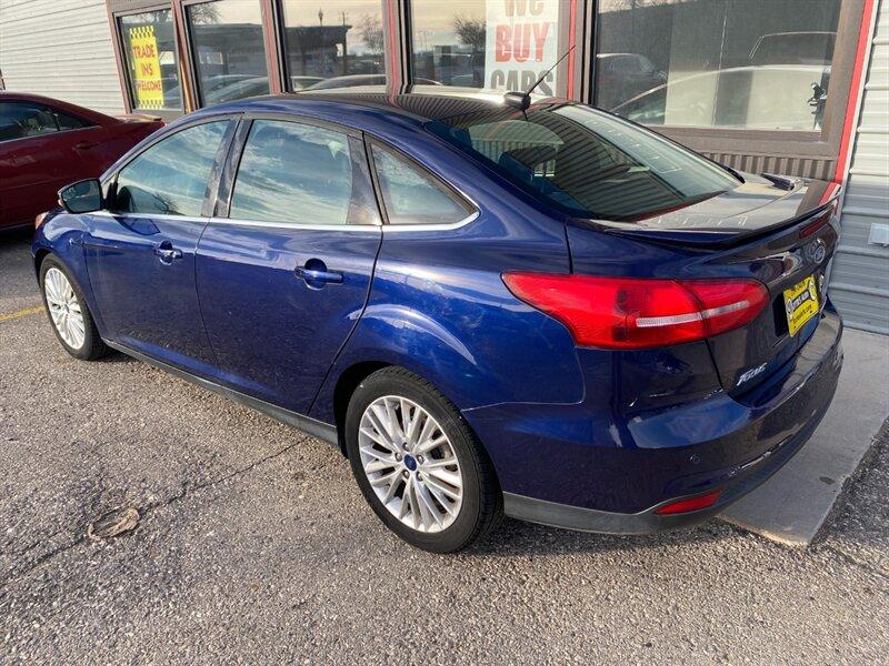 2017 Kona Blue Ford Focus Titanium (1FADP3J25HL) with an 2.0L Flex Fuel I4 160hp 146ft. lbs. engine, Automatic transmission, located at 842 E South Street, Powell, WY, 82435, (307) 754-7289, 44.752300, -108.746933- Photo#3