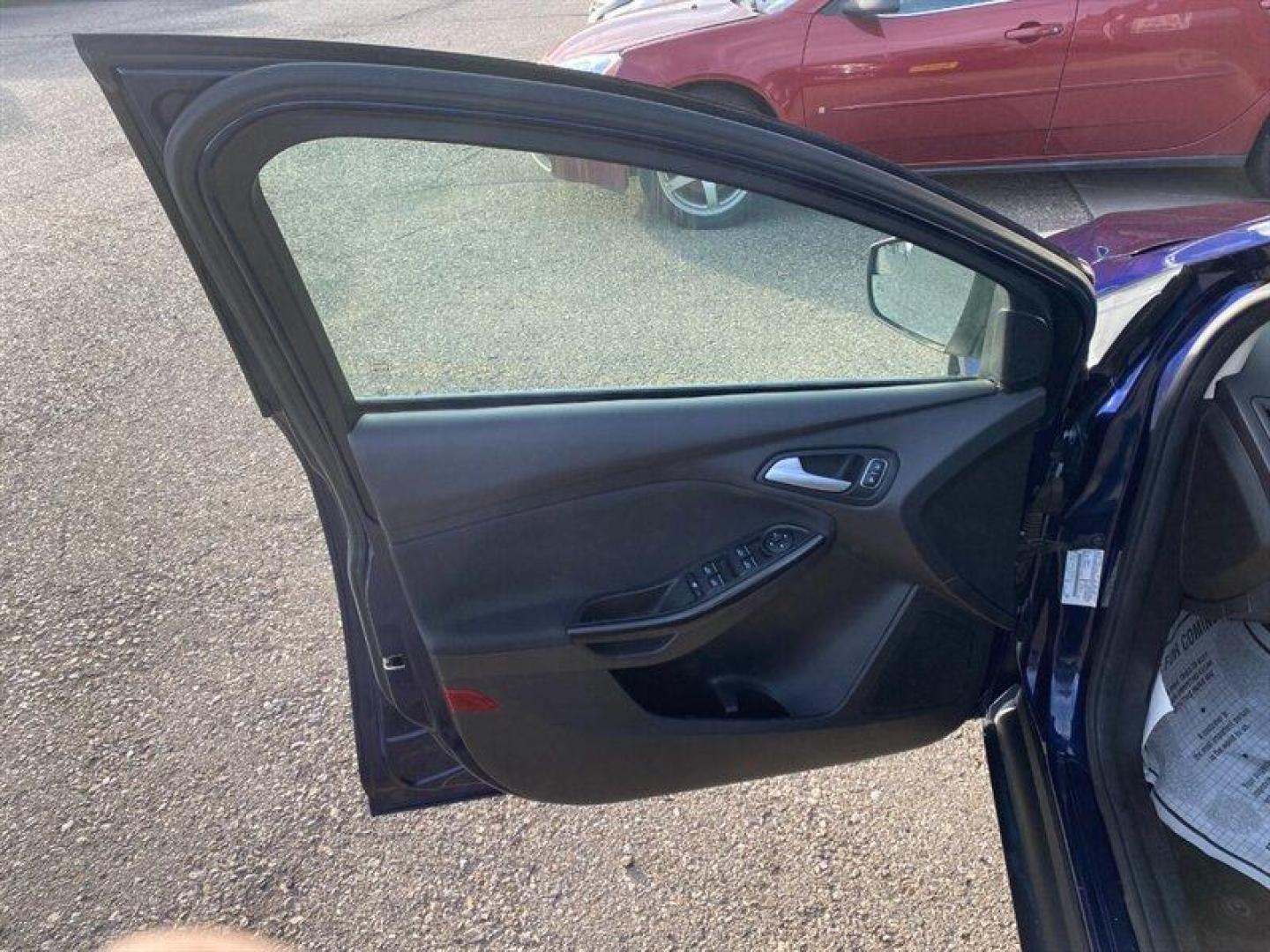 2017 Blue Ford Focus Titanium (1FADP3J25HL) with an 2.0L Flex Fuel I4 160hp 146ft. lbs. engine, 6-Speed Double Clutc transmission, located at 842 E South Street, Powell, WY, 82435, (307) 754-7289, 44.752300, -108.746933 - Photo#4