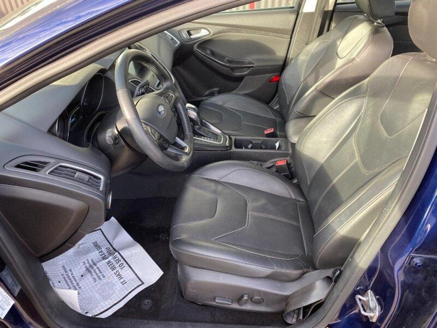 2017 Blue Ford Focus Titanium (1FADP3J25HL) with an 2.0L Flex Fuel I4 160hp 146ft. lbs. engine, 6-Speed Double Clutc transmission, located at 842 E South Street, Powell, WY, 82435, (307) 754-7289, 44.752300, -108.746933 - Photo#5