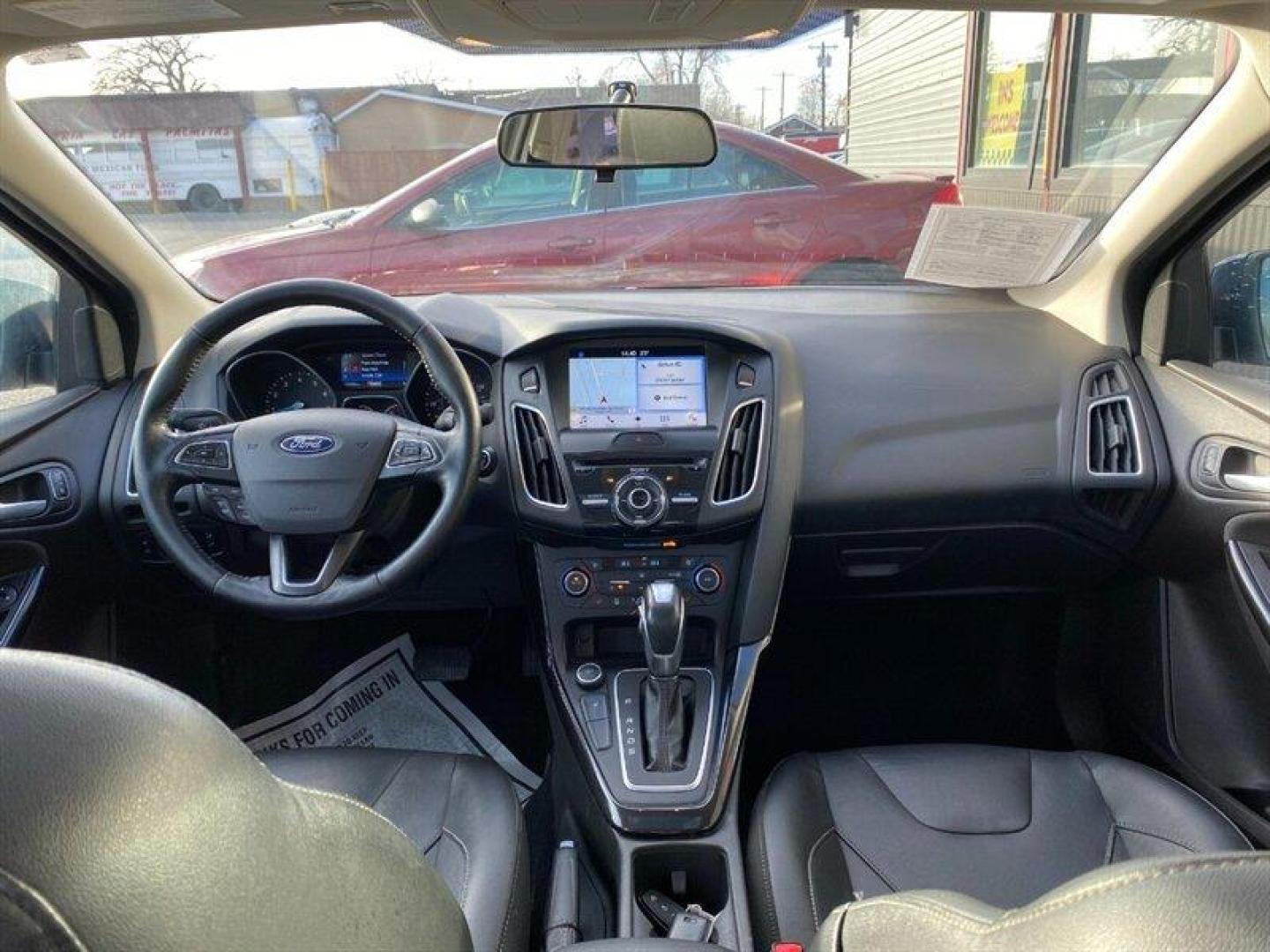 2017 Blue Ford Focus Titanium (1FADP3J25HL) with an 2.0L Flex Fuel I4 160hp 146ft. lbs. engine, 6-Speed Double Clutc transmission, located at 842 E South Street, Powell, WY, 82435, (307) 754-7289, 44.752300, -108.746933 - Photo#7