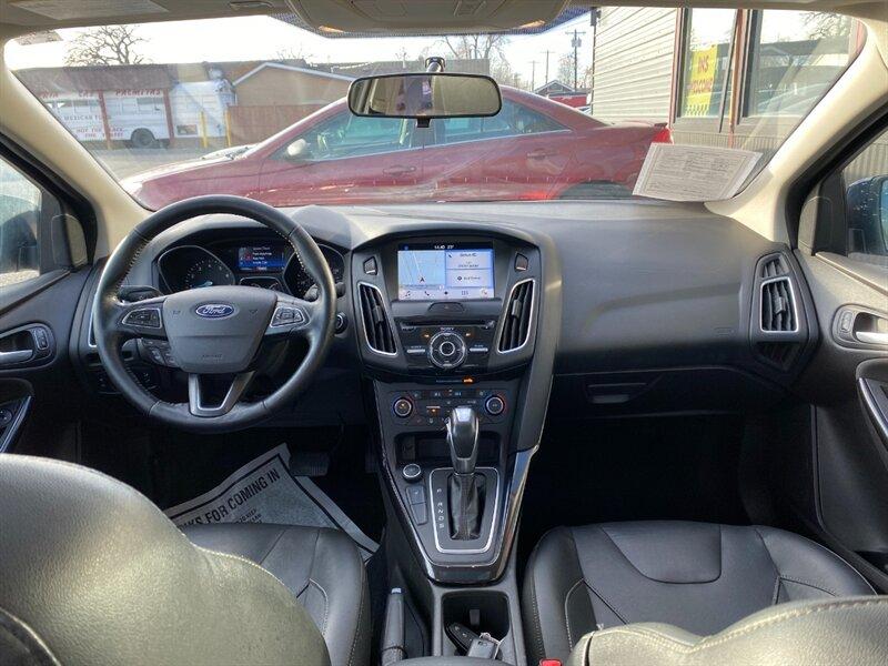 2017 Kona Blue Ford Focus Titanium (1FADP3J25HL) with an 2.0L Flex Fuel I4 160hp 146ft. lbs. engine, Automatic transmission, located at 842 E South Street, Powell, WY, 82435, (307) 754-7289, 44.752300, -108.746933- Photo#7