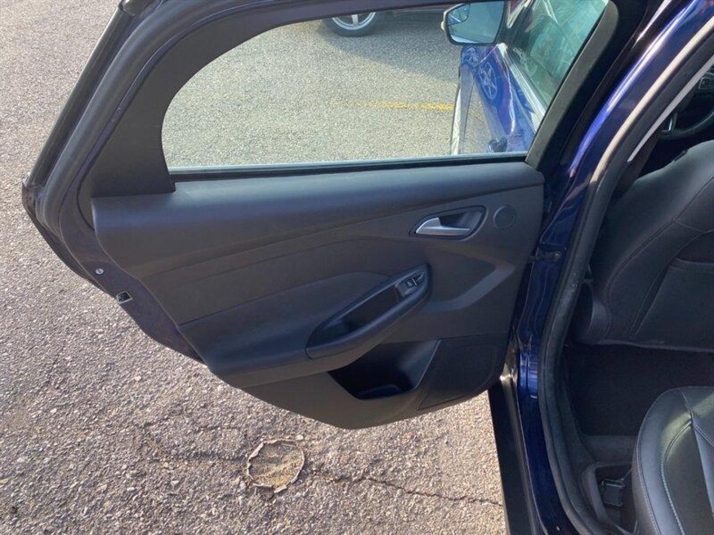 2017 Blue Ford Focus Titanium (1FADP3J25HL) with an 2.0L Flex Fuel I4 160hp 146ft. lbs. engine, 6-Speed Double Clutc transmission, located at 842 E South Street, Powell, WY, 82435, (307) 754-7289, 44.752300, -108.746933 - Photo#8