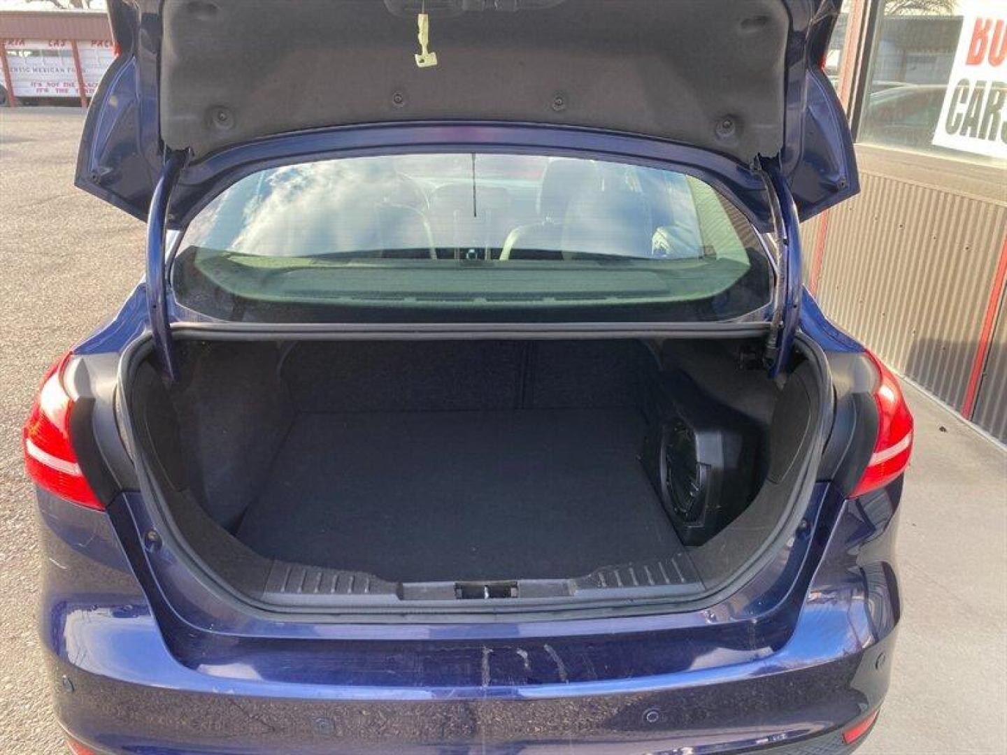 2017 Blue Ford Focus Titanium (1FADP3J25HL) with an 2.0L Flex Fuel I4 160hp 146ft. lbs. engine, 6-Speed Double Clutc transmission, located at 842 E South Street, Powell, WY, 82435, (307) 754-7289, 44.752300, -108.746933 - Photo#10