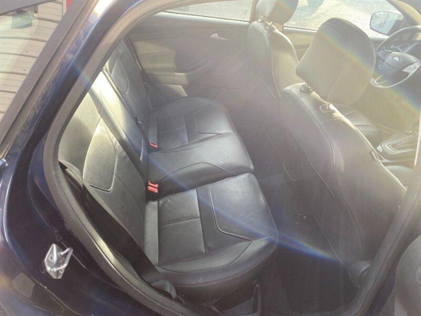 2017 Blue Ford Focus Titanium (1FADP3J25HL) with an 2.0L Flex Fuel I4 160hp 146ft. lbs. engine, 6-Speed Double Clutc transmission, located at 842 E South Street, Powell, WY, 82435, (307) 754-7289, 44.752300, -108.746933 - Photo#12