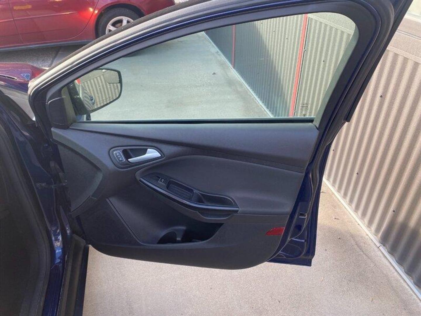 2017 Blue Ford Focus Titanium (1FADP3J25HL) with an 2.0L Flex Fuel I4 160hp 146ft. lbs. engine, 6-Speed Double Clutc transmission, located at 842 E South Street, Powell, WY, 82435, (307) 754-7289, 44.752300, -108.746933 - Photo#13