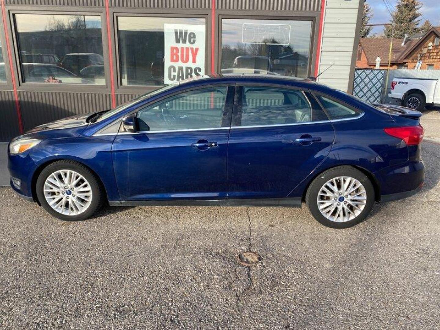 2017 Blue Ford Focus Titanium (1FADP3J25HL) with an 2.0L Flex Fuel I4 160hp 146ft. lbs. engine, 6-Speed Double Clutc transmission, located at 842 E South Street, Powell, WY, 82435, (307) 754-7289, 44.752300, -108.746933 - Photo#17