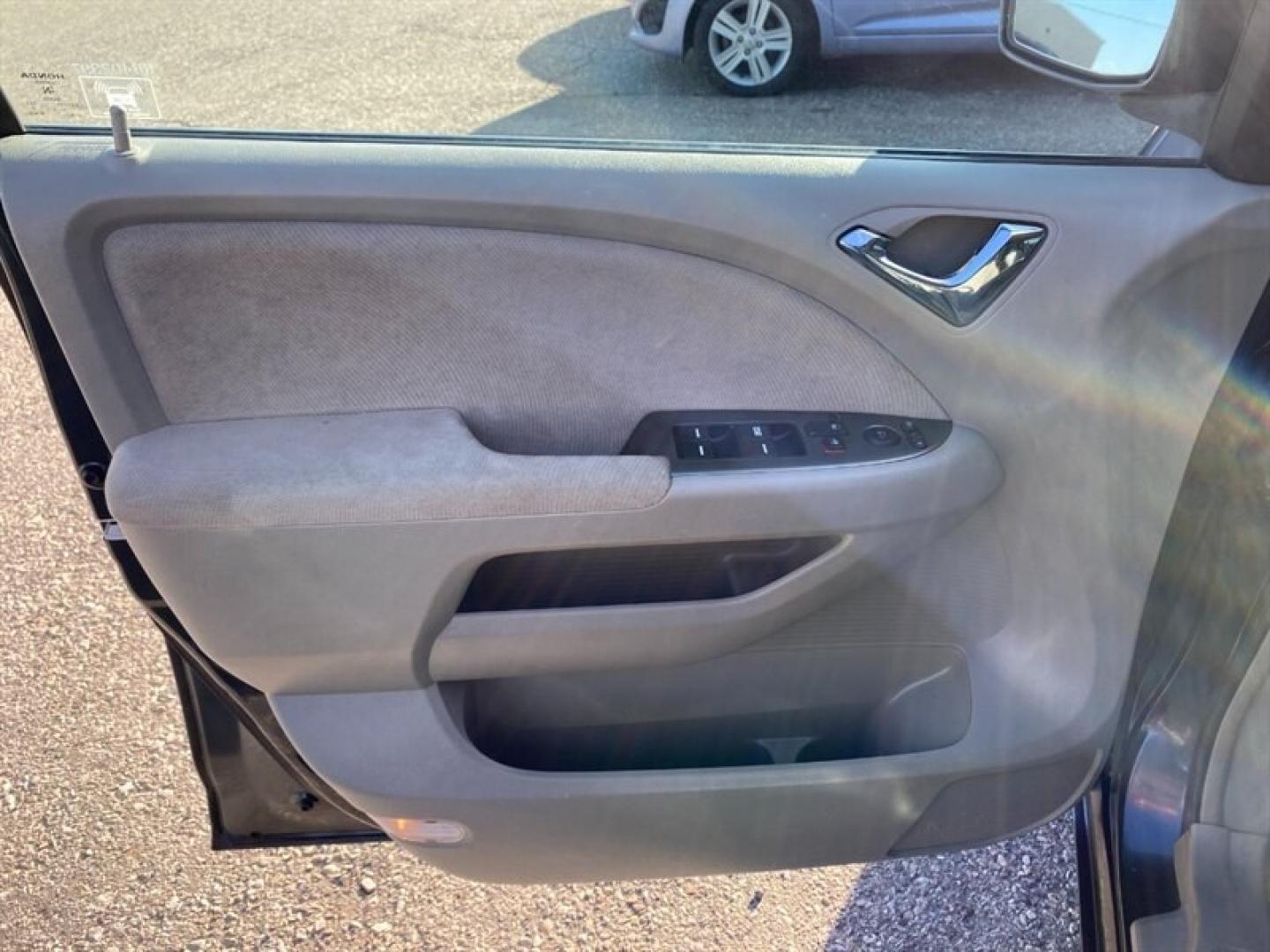 2006 Blue Honda Odyssey EX (5FNRL384X6B) with an 3L NA V6 single overhead cam (SOHC) 24V engine, Automatic transmission, located at 842 E South Street, Powell, WY, 82435, (307) 754-7289, 44.752300, -108.746933- Photo#6