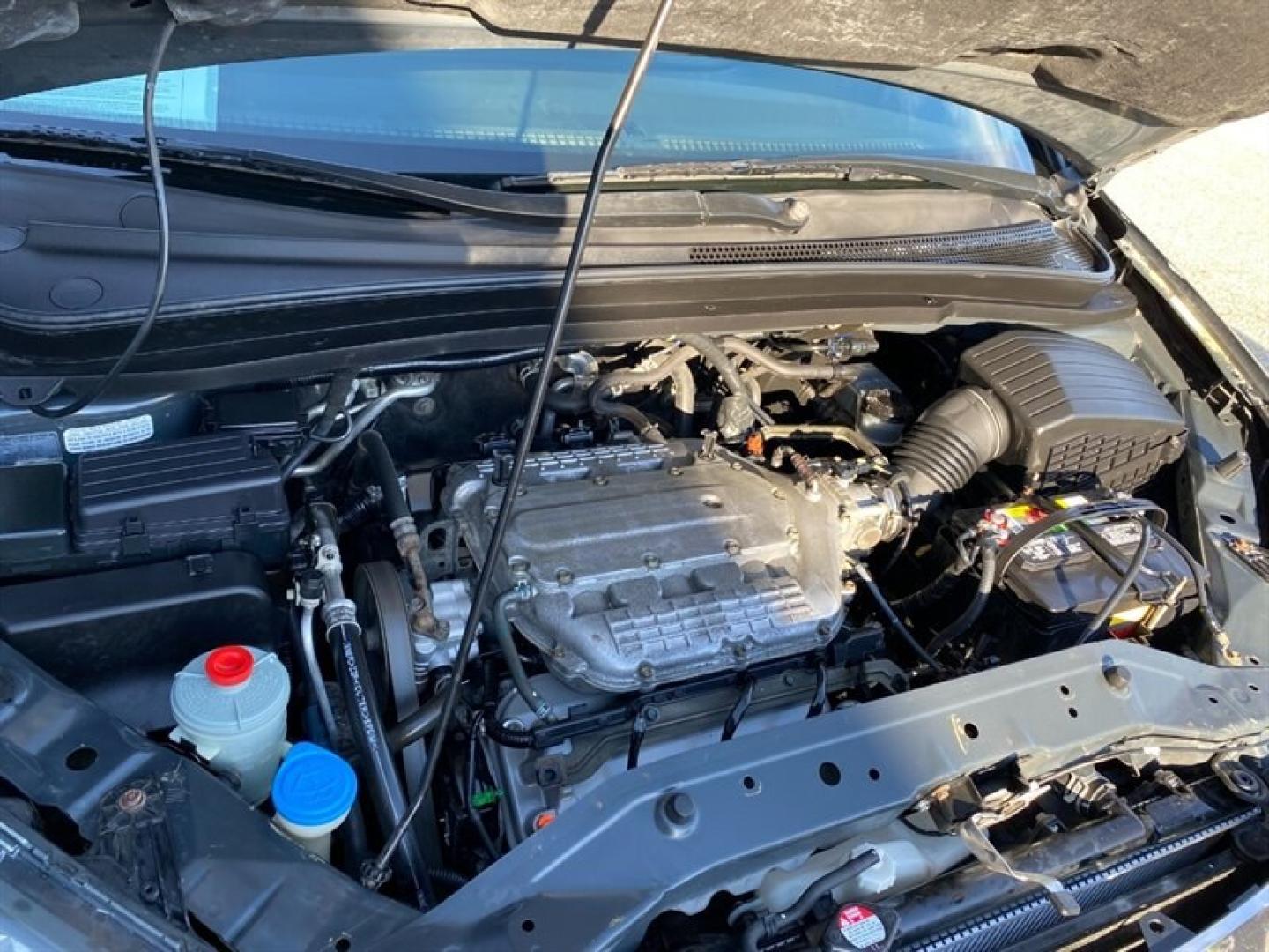 2006 Blue Honda Odyssey EX (5FNRL384X6B) with an 3L NA V6 single overhead cam (SOHC) 24V engine, Automatic transmission, located at 842 E South Street, Powell, WY, 82435, (307) 754-7289, 44.752300, -108.746933- Photo#26