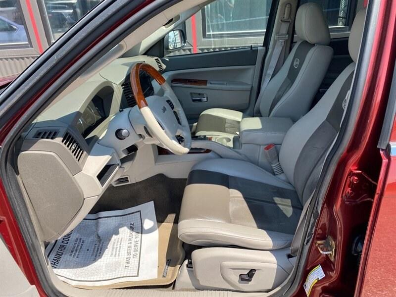 2007 Red Jeep Grand Cherokee Overland (1J8HR682X7C) with an HEMI 5.7L V8 330hp 375ft. lbs. engine, 5-Speed Shiftable Au transmission, located at 842 E South Street, Powell, WY, 82435, (307) 754-7289, 44.752300, -108.746933- Photo#5