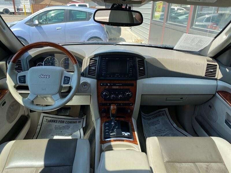 2007 Red Jeep Grand Cherokee Overland (1J8HR682X7C) with an HEMI 5.7L V8 330hp 375ft. lbs. engine, 5-Speed Shiftable Au transmission, located at 842 E South Street, Powell, WY, 82435, (307) 754-7289, 44.752300, -108.746933- Photo#7