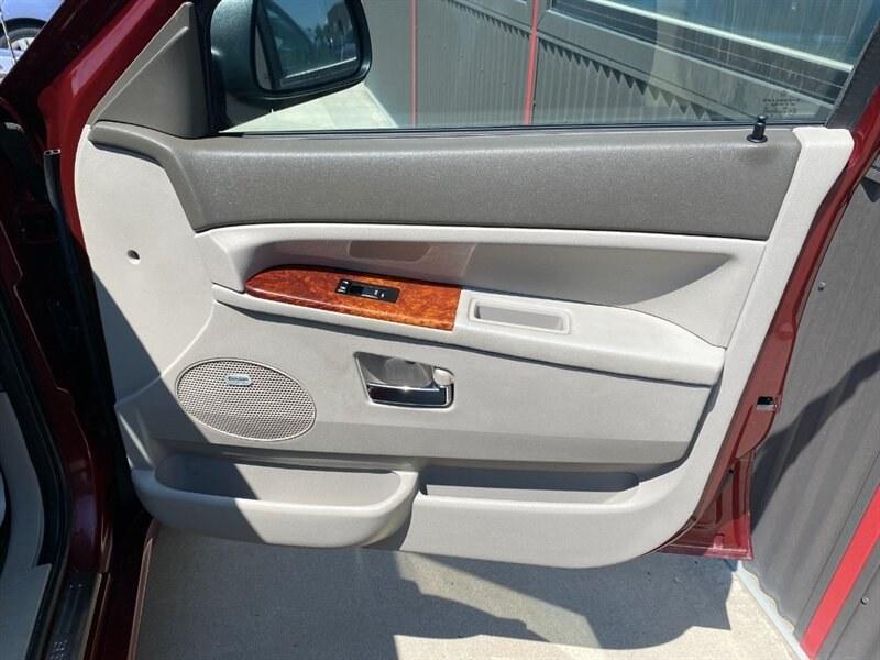 2007 Red Jeep Grand Cherokee Overland (1J8HR682X7C) with an HEMI 5.7L V8 330hp 375ft. lbs. engine, 5-Speed Shiftable Au transmission, located at 842 E South Street, Powell, WY, 82435, (307) 754-7289, 44.752300, -108.746933- Photo#14